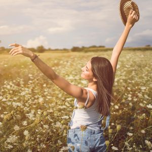 Girl in sunny field in Syracuse, NY