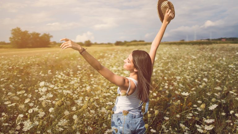 Girl in sunny field in Syracuse, NY