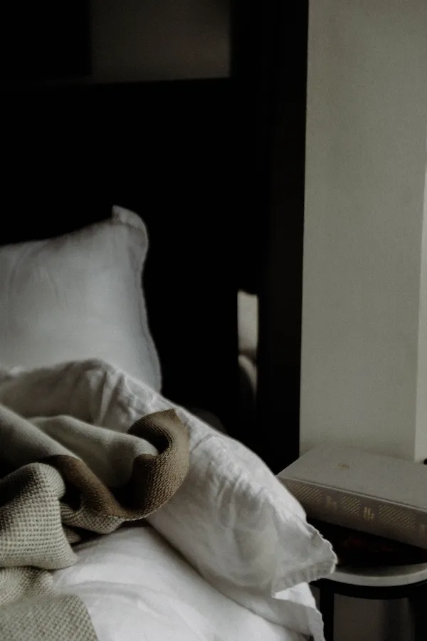 side of bed unmade
